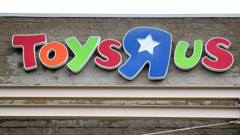 EMERYVILLE, CA - MARCH 15:  The Toys R Us logo is displayed on the exterior of a store on March 15, 2018 in Emeryville, California. Toys R Us filed for liquidation in a U.S. Bankruptcy court and plans to close 735 stores leaving 33,000 workers without employment.  (Photo by Justin Sullivan/Getty Images)