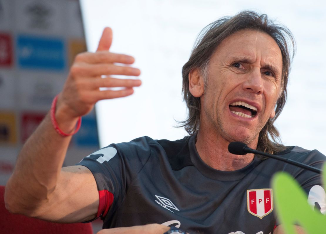 Peru's Argentine coach Ricardo Gareca protests the 14-month sanction in a press conference.