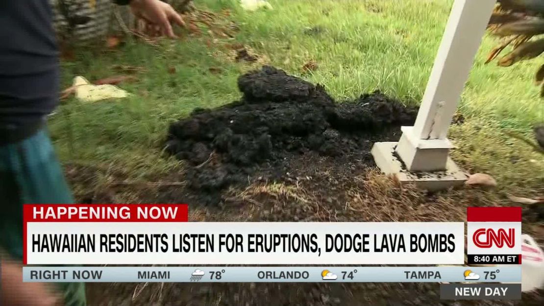 A lava bomb landed next to a house guarded by Darryl Clinton.