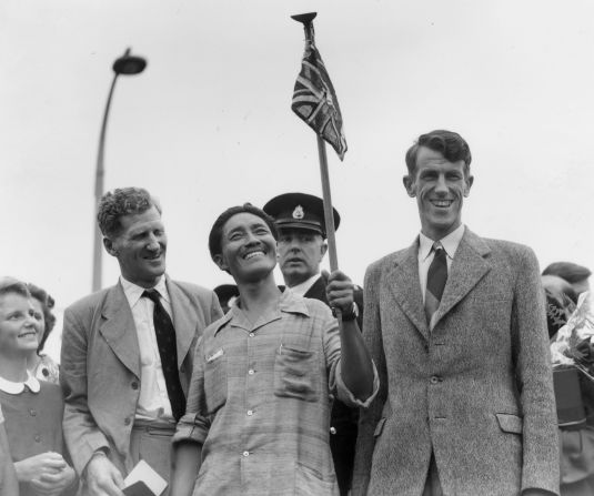 <strong>1953: First summit --</strong> Tenzing Norgay (C), better known as Sherpa Tensing, and Edmund Hillary (R) were the <a href="index.php?page=&url=http%3A%2F%2Fwww.guinnessworldrecords.com%2Fworld-records%2Ffirst-ascent-of-mount-everest" target="_blank" target="_blank">first to complete a successful ascent</a> to the top of the world in May 1953.