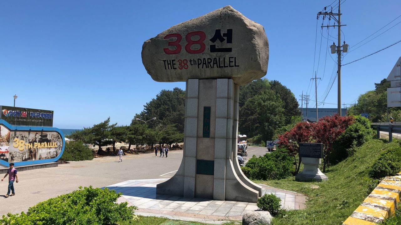 A stone monument indicates the original dividing line between North and South Korea, established in 1945 when Japan surrendered. 