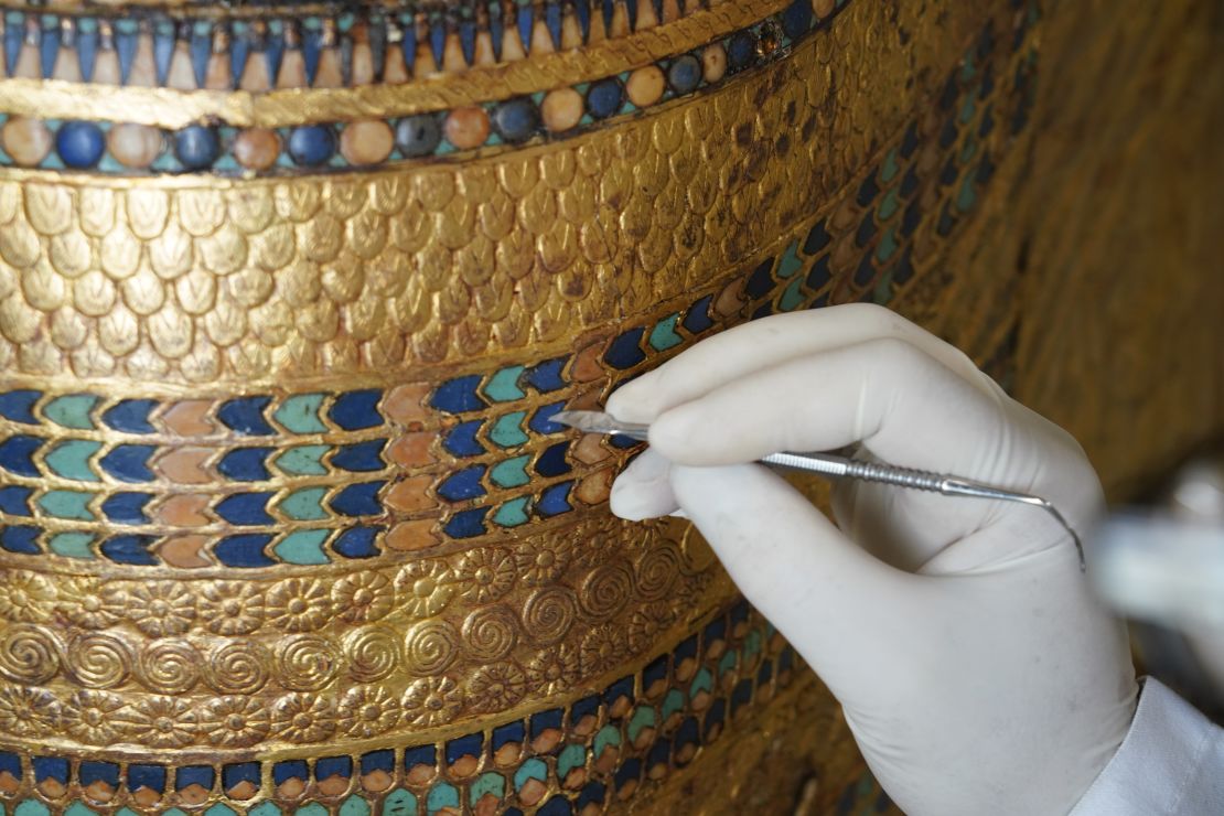 Rami Magdy works on the restoration of a chariot from Tutankhamun's tomb at the Wood Laboratory in the Grand Egyptian Museum's conservation center. The first phase of the GEM will open at the end of this year and will feature a special display of thousands of treasures from Tutankhamun's tomb, many never before on dislplay.
