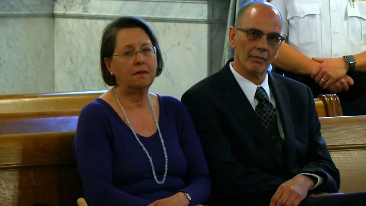 Christina and Mark Rotondo sit in the courtroom during the proceedings.