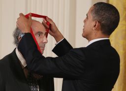 President Barack Obama presents the 2010 National Humanities Medal to Philip Roth at the White House. 