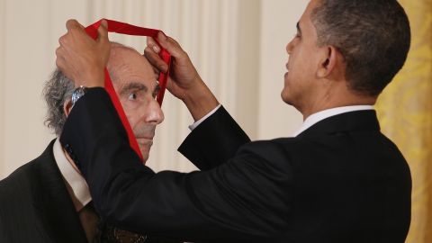 President Barack Obama presents the 2010 National Humanities Medal to Philip Roth at the White House. 