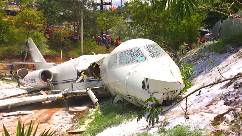 Jet splits in half in crash landing CNN