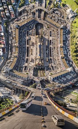 In "Bus Station," vehicles appear to defy gravity as they drive out of a city -- Istanbul -- that feels both familiar and uncanny. <br />