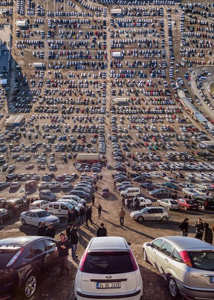 A second-hand car bazaar, where used vehicles stretch out as far as the eye can see, Istanbul.
