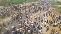 This frame grab from video provided by KK Productions shows protestors crowd a road in Tuticorin, in the southern Indian state of Tamil Nadu, Tuesday, May 22, 2018. Police opened fire Tuesday on protesters demanding the closure of a south Indian copper plant, killing nine people, officials said. The violence came amid months of protests against the Sterlite copper smelting plant in the town of Tuticorin, which demonstrators say has polluted the area's groundwater and put local fisheries at risk. (KK Production via AP)