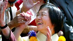 KATHMANDU, NEPAL - MAY 27:  Japanese climber Junko Tabei, the first woman to summit Mt. Everest in 1975, is greeted by friends during a procession celebrating the 50th anniversary of the ascent of the world's highest mountain on May 27, 2003 in Kathmandu, Nepal.  This week marks the 50th anniversary of the first ascent of Mount Everest.  (Photo by Paula Bronstein/Getty Images) 