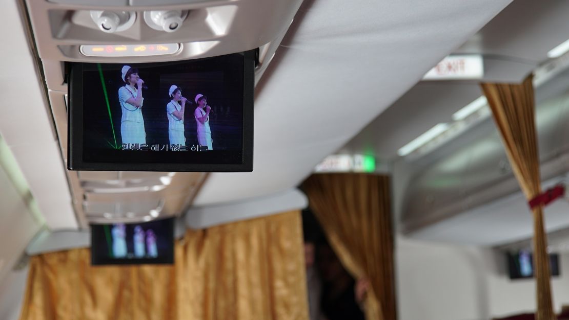 The in-flight entertainment on board a chartered Air Koryo flight the journalists took to Wonsan, North Korea. 