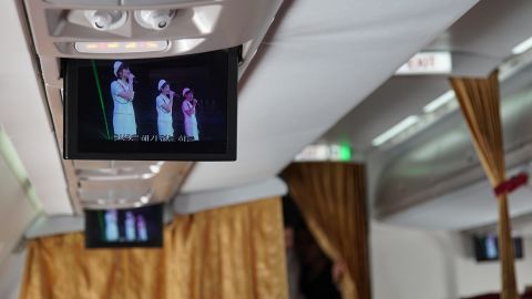 The in-flight entertainment on board a chartered Air Koryo flight the journalists took to Wonsan, North Korea.