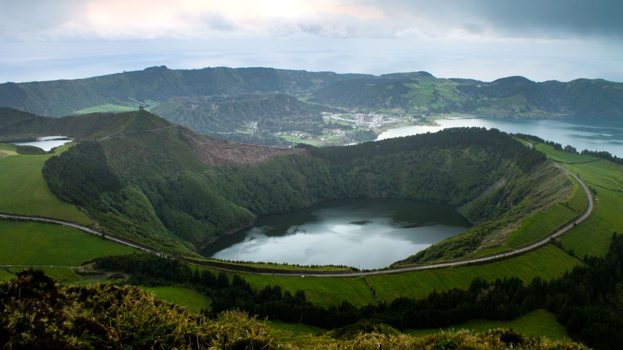 Lagoa das Sete Cidades is a twin lake situated in the crater of a dormant volcano in the Azores archipelago.