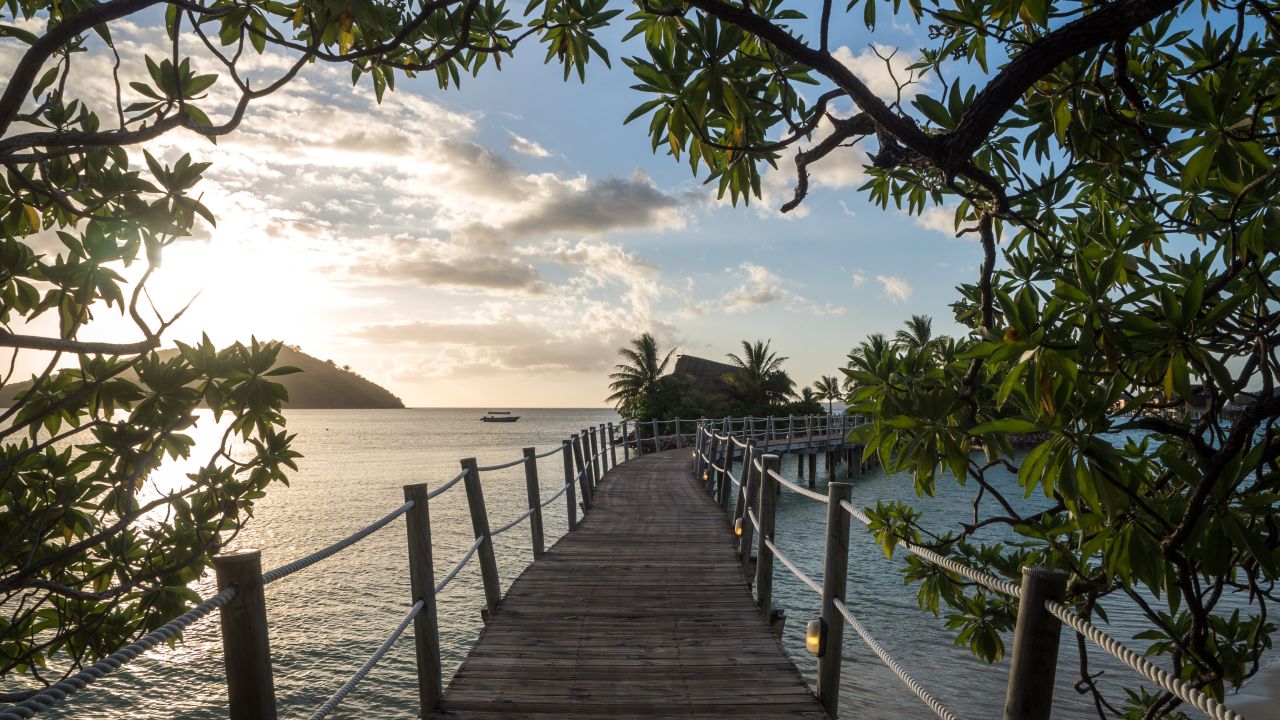 <strong>Fiji:</strong> Walk on water -- or right above it -- on the boardwalk out to a bungalow in Fiji.