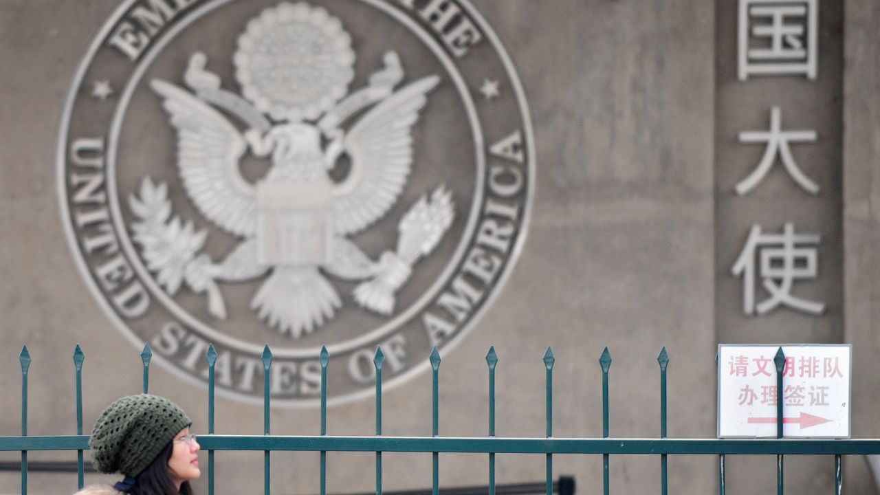 A woman walks past the United States embassy in Beijing on February 6, 2010 where a US missionary released by North Korea after entering the communist country on Christmas Day to protest against human rights abuses is being assisted by embassy consular officers after his arrival in Beijing en route to his homeland, the US embassy said.  North Korean authorities detained Robert Park, 28, for illegal entry after he crossed a frozen border river from China carrying a letter calling on leader Kim Jong-Il to free political prisoners, shut prison camps, improve rights and step down. The missionary had expressed "sincere repentance" for his actions, which were prompted by "false propaganda" from the West, the North's official news agency said on February 5 upon announcing his release.    AFP PHOTO/Frederic J. BROWN (Photo credit should read FREDERIC J. BROWN/AFP/Getty Images)