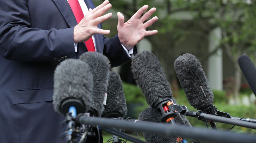 WASHINGTON, DC - MAY 23: U.S. President Donald Trump speaks to the media as he walks across the South Lawn while departing the White House May 23, 2018 in Washington, DC. Trump is traveling to New York where he will tour the Morrelly Homeland Security Center and then attend a roundtable discussion and dinner with supporters before returning to Washington. (Photo by Chip Somodevilla/Getty Images)