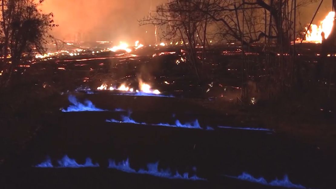 The blue flames are produced by burning methane.