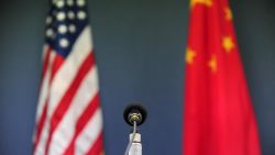 The US and China flags stand behind a microphone awaiting the arrival of US Senator John McCain, who was joined by Senators Lindsey Graham Amy Klobuchar for a press conference at the US Embassy in Beijing on April 9, 2009 during the China stop of the Congressional Delegation's fact-finding Asia-tour. Senator McCain said he urged Chinese officials in talks here to back a strong United Nations response to North Korea's rocket launch, but indicated China had resisted. AFP PHOTO/Frederic J. BROWN (Photo credit should read FREDERIC J. BROWN/AFP/Getty Images)