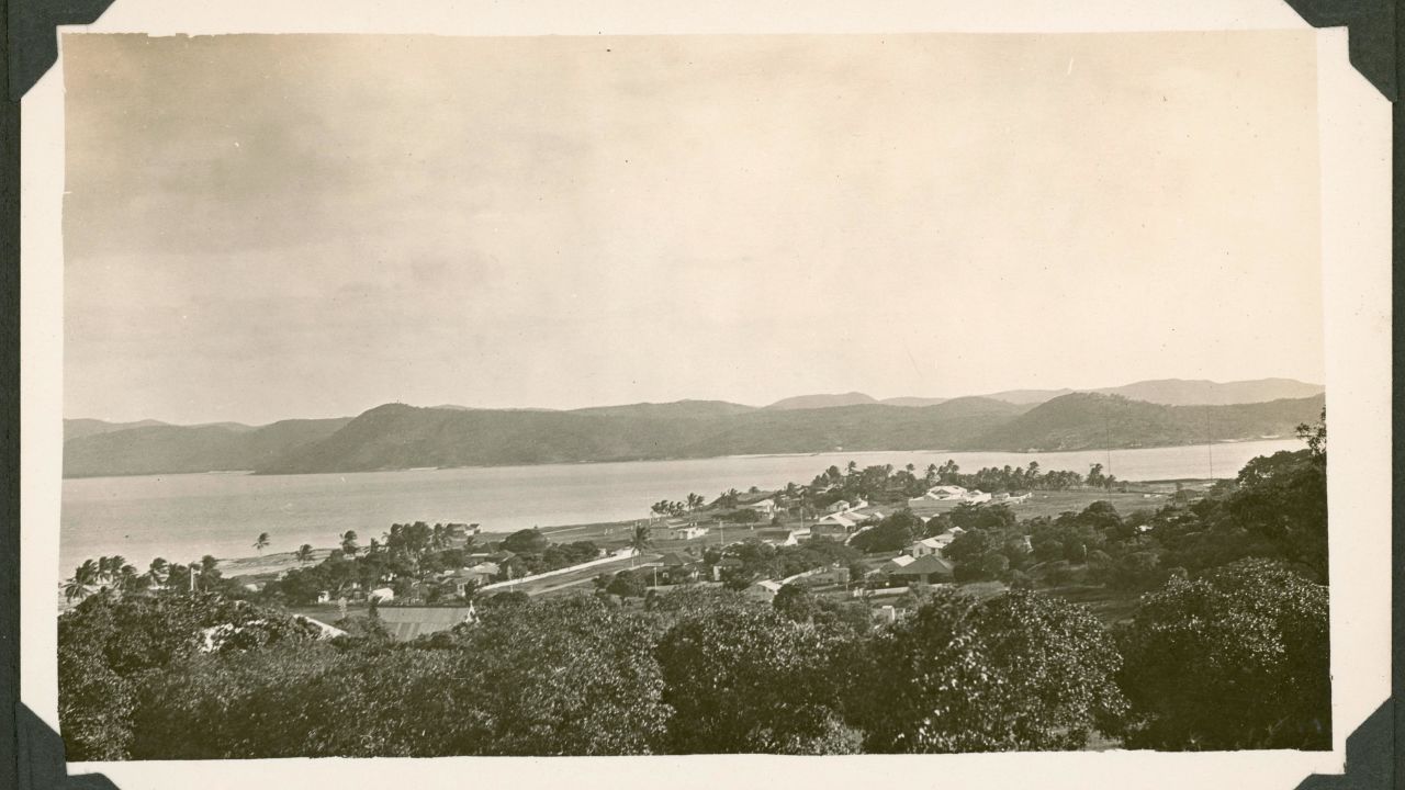 View over Thursday Island with Prince of Wales Island in the background, taken around 1928
