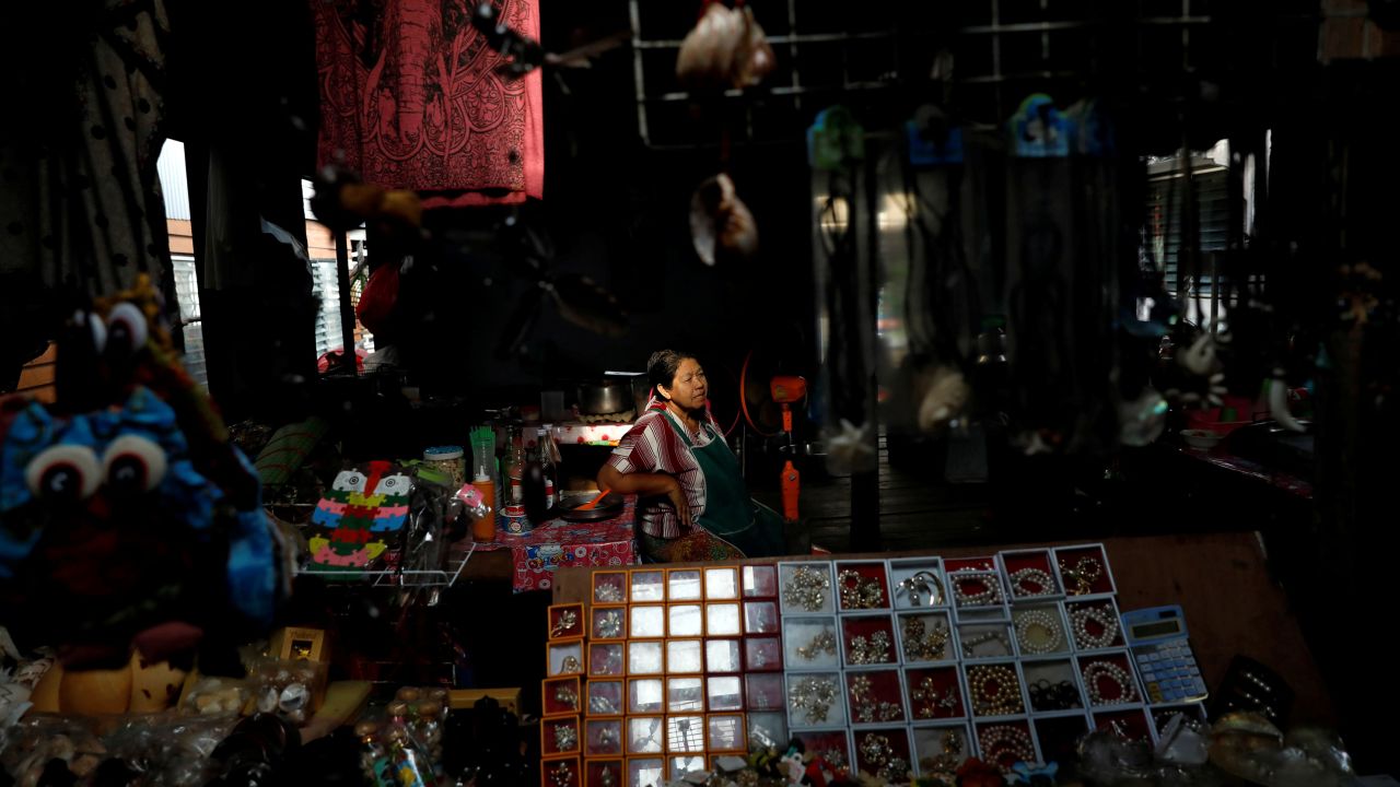 <strong>Ko Panyi, Thailand: </strong>The floating fishing village of Ko Panyi, in Phang Nga Province, was built on stilts by Indonesian fishermen. Here, a woman selling souvenirs and trinkets awaits customers in her shop. <br />