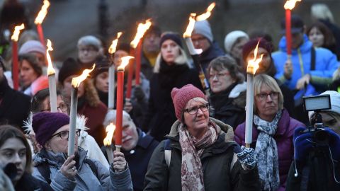 People attend a rally in Stockholm, Sweden, in support of #metoo. 