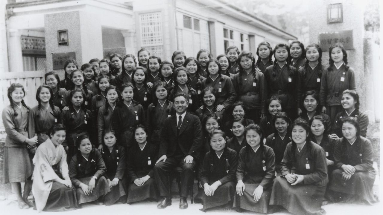 Students from the Okinawa Female Normal School with their principal Sadao Noda. 