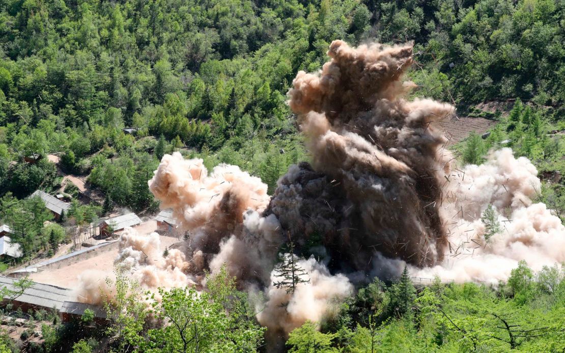 A May 24 photo shows an explosion at tunnel 4 of North Korea's nuclear test site.