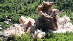 In this Thursday, May 24, 2018 photo, The fourth tunnel of North Korea's nuclear test site is blown up in Punggye-ri, North Korea. North Korean leader Kim Jong Un made good on his promise to demolish his country's nuclear test site, which was formally closed in a series of huge explosions Thursday as a group of foreign journalists looked on. (Korea Pool/Yonhap via AP)