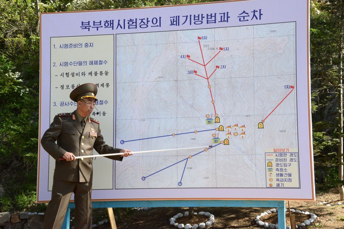 An official, identified only as the Deputy Director of North Korea's Nuclear Institute, briefs reporters before the detonations.