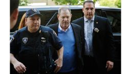 Harvey Weinstein is escorted into court, Friday, May 25, 2018, in New York. The movie mogul turned himself in at a police precinct earlier Friday.   (AP Photo/Mark Lennihan)