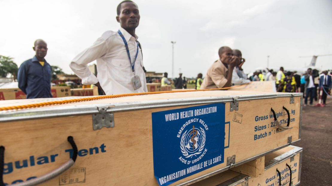 A health official supervises World Health Organization medical supplies at the airport in Mbandaka, Congo.