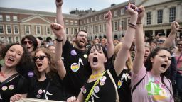 DUBLIN, IRELAND - MAY 26: Yes vote supporters celebrate as the results in the Irish referendum on the 8th amendment concerning the country's abortion laws takes place at Dublin Castle on May 26, 2018 in Dublin, Ireland. Savita Halappanavar who became the symbol of the Yes campaign to repeal the 8th amendment died aged 32 due to complications following a septic miscarriage in Galway, 2012. Voters in Ireland went to the polls yesterday to decide whether to abolish or keep the 8th amendment which makes it illegal for a woman to have an abortion in the country unless in certain circumstances where her life is at risk. Exit polls indicated that the Yes vote has won by a landslide majority and the No campaign has conceded defeat. (Photo by Charles McQuillan/Getty Images)