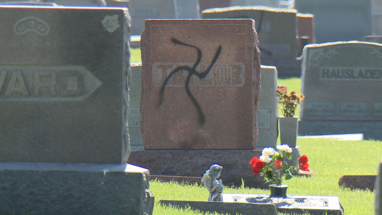 A vandalized cemetery tombstone in Glen Carbon, Illinois.