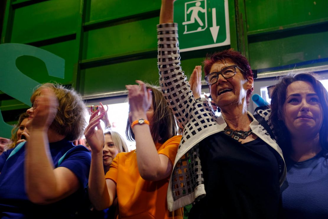 Ailbhe Smyth, co-director of the pro-repeal umbrella group Together for yes, greets supporters at the count in Dublin on Saturday. 