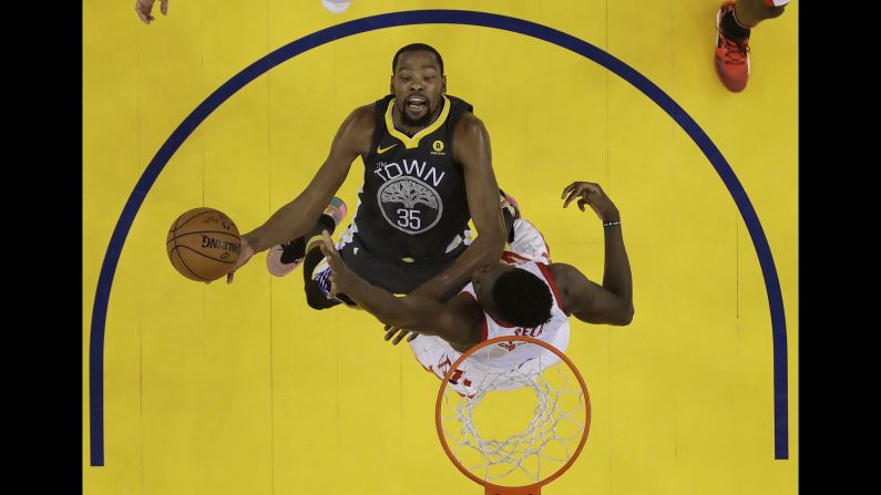 Golden State Warriors forward Kevin Durant shoots against Houston Rockets center Clint Capela during game four of the NBA's Western Conference Finals in Oakland, California, on Tuesday, May 22. 
