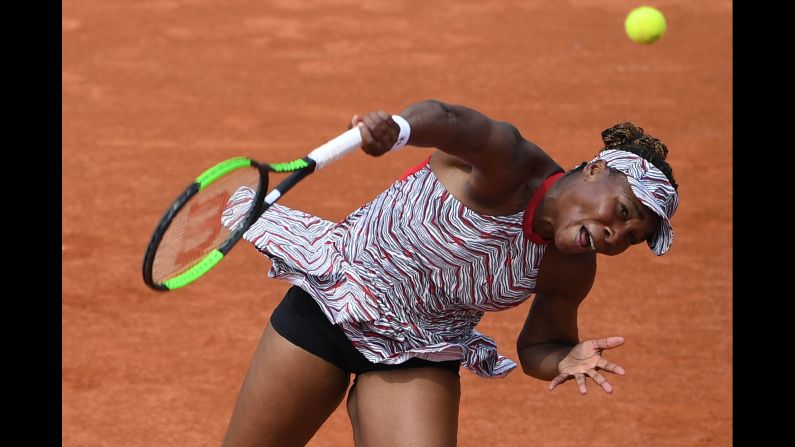 Venus Williams of the United States serves to China's Wang Qiang during a first round match at the Roland Garros 2018 French Open in Paris on Sunday, May 27. 