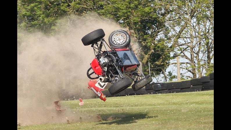 Nelson Rowe's car flips in the air during the Formula Ford race at Historic Sports Car Club Wolds Trophy meeting at Cadwell Park in Louth, England, on Sunday, May 20.