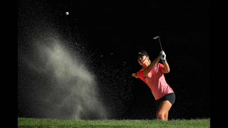 Danielle Kang blasts out of the bunker during the first round of the LPGA Volvik Championship in Ann Arbor, Michigan, on Thursday, May 24.