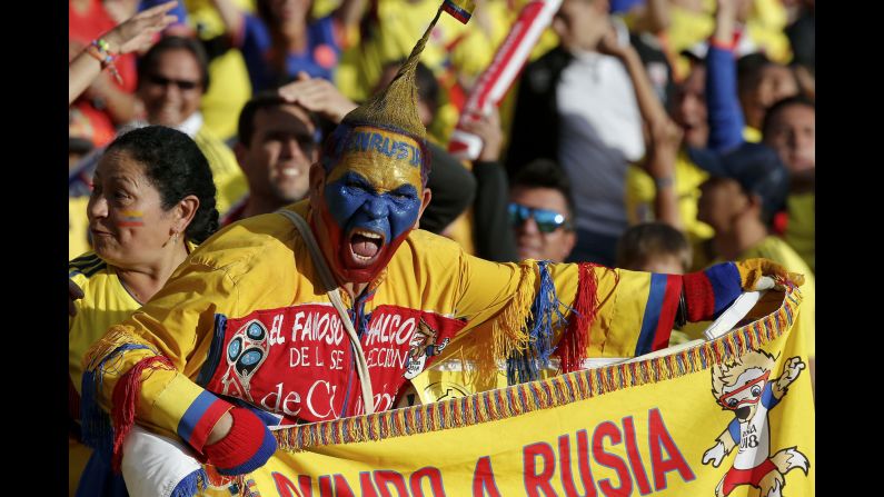 A fan of the Colombia national soccer team cheers from the stands during a farewell exhibition game at the Nemesio Camacho stadium in Bogota, Colombia, on Friday, May 25. Colombia will also play a friendly match against Egypt in Italy before heading to Russia for the 2018 FIFA World Cup. 