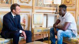 Emmanuel Macron and Mamoudou Gassama. French President Emmanuel Macron meets Mamoudou Gassama at Elysee Palace. Parid, FRANCE- 28/05/1018 (Sipa via AP Images)