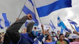 TOPSHOT - Anti-government demonstrators hold a protest demanding Nicaraguan President Daniel Ortega and his wife, Vice President Rosario Murillo, stand down, in Managua on May 26, 2018. - Hundreds of protesters dug in around Nicaragua on Saturday, blocking roads as at least eight more people were killed in a 24-hour period. Unrest has resumed since week-long church-mediated talks between the government and opposition to quell a month of violence broke down late on Wednesday. (Photo by Inti OCON / AFP)        (Photo credit should read INTI OCON/AFP/Getty Images)