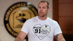 Jason Seaman, a seventh grade science teacher at Noblesville West Middle School in Noblesville, Ind., speaks to the media during a press conference Monday, May 28, 2018. Seaman tackled and disarmed a student with a gun at the school on Friday. He was shot but not seriously injured. (AP Photo/Michael Conroy)