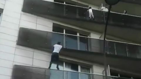 The remarkable moment Gassama scaled a building.