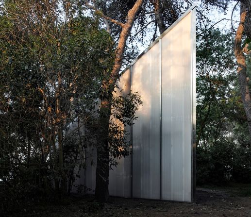 Inside New York architect Andrew Berman's wood-and-polycarbonate design, there is only a solitary seat, positioned in front of a lectern and under a beam of light, suggesting, he said in a statement, that "it is a space for looking inward, under light amidst darkness."