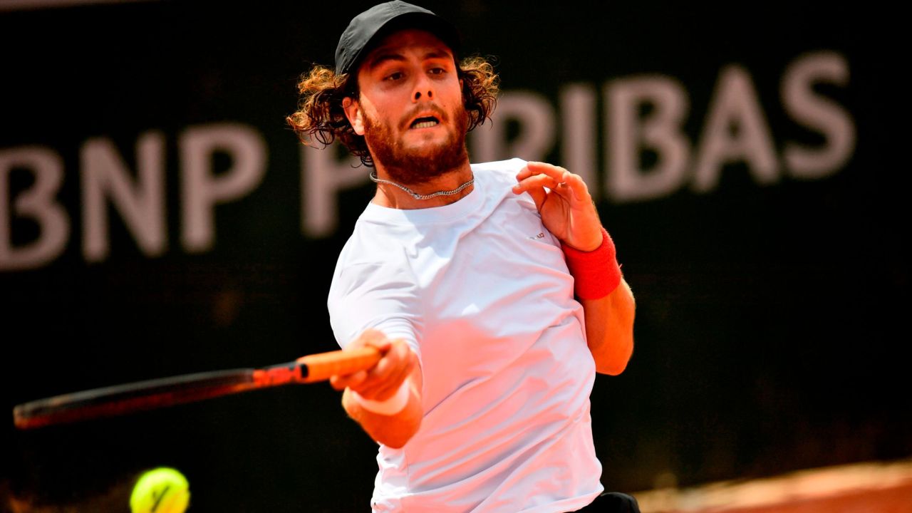 Marco Trungelliti hits a forehand in his win over Bernard Tomic at the French Open.