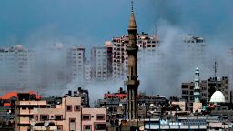 A picture taken from Gaza City on May 29, 2018, shows a smoke billowing in the background following an Israeli air strike on the Palestinian enclave. - Israel struck bases of militant groups in the Gaza Strip, the enclave's Islamist rulers Hamas said, hours after nearly 30 mortar shells were fired at the Jewish state. (Photo by THOMAS COEX / AFP)        (Photo credit should read THOMAS COEX/AFP/Getty Images)