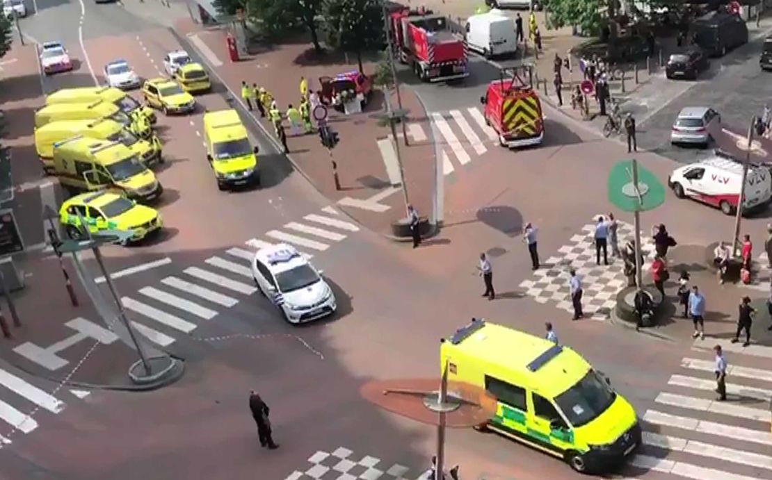 In this grab made from a video obtained on the Twitter account of Victor Jay (@victorj_fr), police and emergency vehicles block a nearby crossroads.