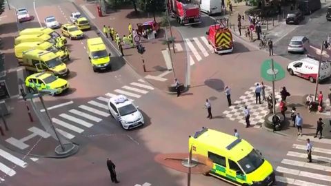 In this grab made from a video obtained on the Twitter account of Victor Jay (@victorj_fr), police and emergency vehicles block a nearby crossroads.