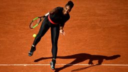 Serena Williams of the US serves to Czech Republic's Kristyna Pliskova during their women's singles first round match on day three of The Roland Garros 2018 French Open tennis tournament in Paris on May 29, 2018. (Photo by CHRISTOPHE SIMON / AFP)        (Photo credit should read CHRISTOPHE SIMON/AFP/Getty Images)