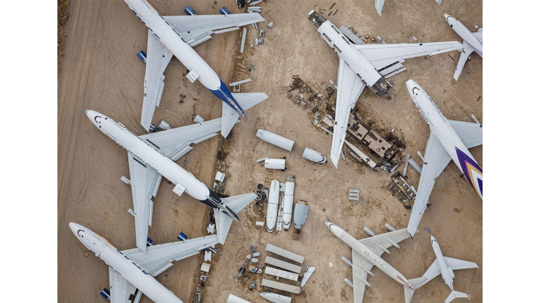 <strong>Risky business:</strong> Photographing the boneyards was an expensive process -- Kelley and his team had to rent a helicopter in LA and fly it deep into the desert. <em>Pictured here: Aircraft waiting to be scrapped at the Mojave Air and Space Port</em>